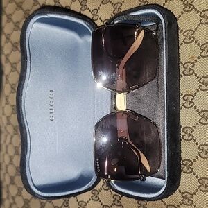 Gucci Women's Sunglasses with Gold Frame and Brown Lenses